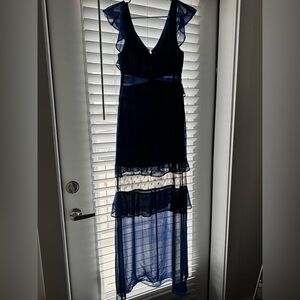 Blue dress not as see through as the picture shows. Wore for a wedding.